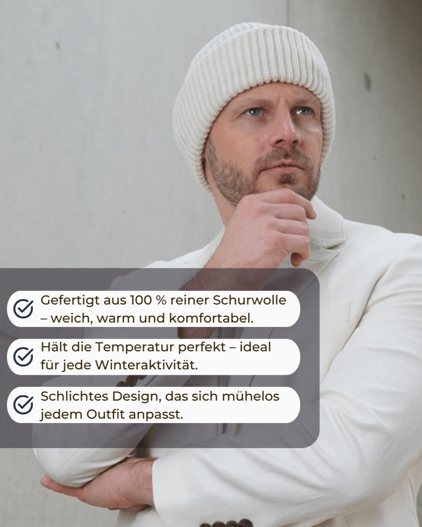 Beanie-Wollmütze schneeweiss getragen von einem Mann mit Produktvorteilen